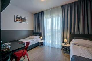 Отель Wiki Sanok Санок Стандартный двухместный номер с 2 отдельными кроватями-5